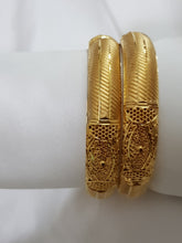 Lustrous Revolve Bangles