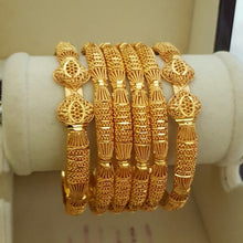 Glossy Gold Tone Affluent Legacy Bangles