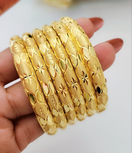 Noble Opulence Gold Polished Bangles