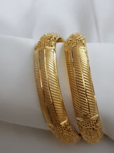 Lustrous Revolve Bangles