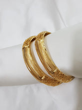 Lustrous Revolve Bangles