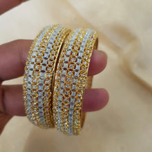 Luxe Legacy One Karat Twist Bangles