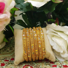 Imperial Unlock Gold Tone Bangles