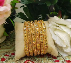 Imperial Unlock Gold Tone Bangles