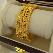 Regal Charm Gold Polished Bangles/Karay