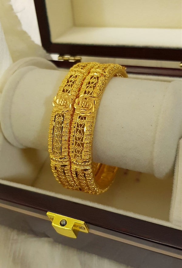 Regal Charm Gold Polished Bangles/Karay