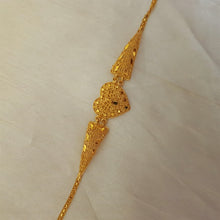 Gleaming Gold Tone Bracelet