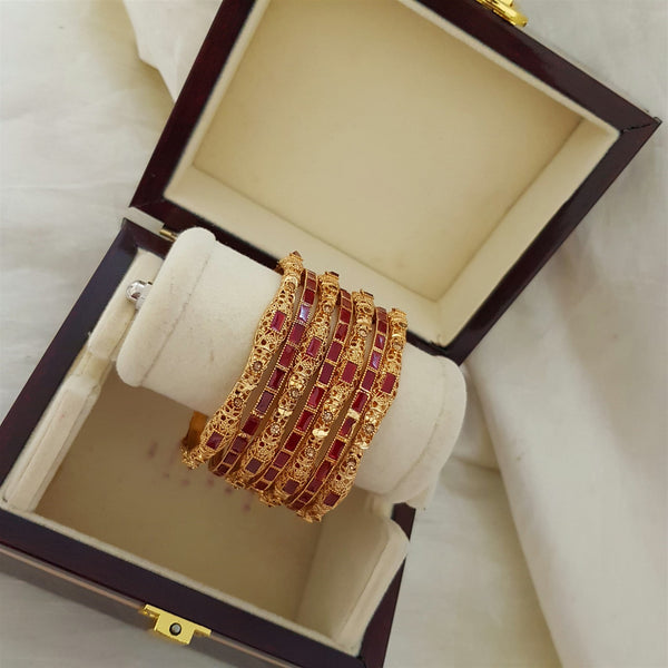 Gleaming Keyhole Gold Look Bangles