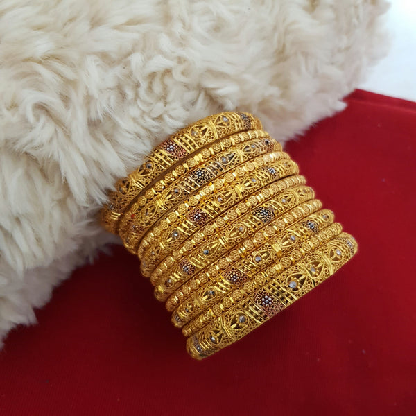 Gleaming Gold Polished Bangles Set