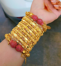Adorn your wrists with our Golden Gleam Bangles