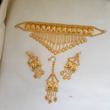 Ornate Gold Adorned Necklace